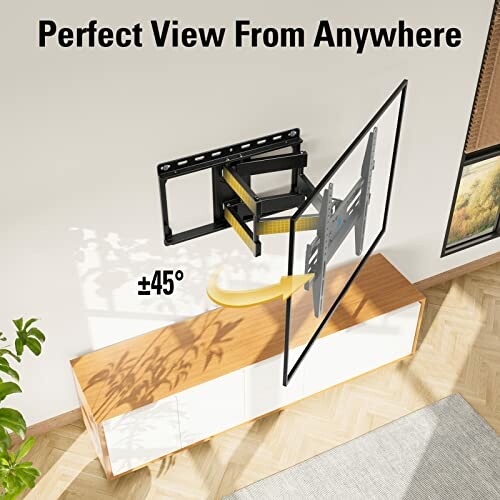 Adjustable wall mount TV bracket with 45-degree rotation over a wooden cabinet.