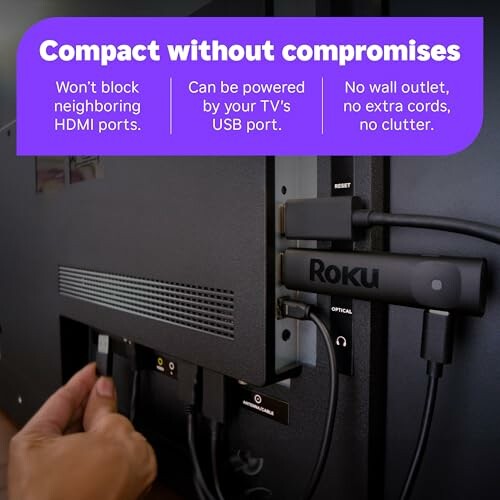 Back of TV showing Roku streaming stick connected to HDMI port